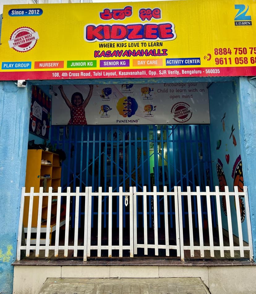 Secure entrance of best preschool Kidzee Kasavanahalli with safety gate and colorful welcome area