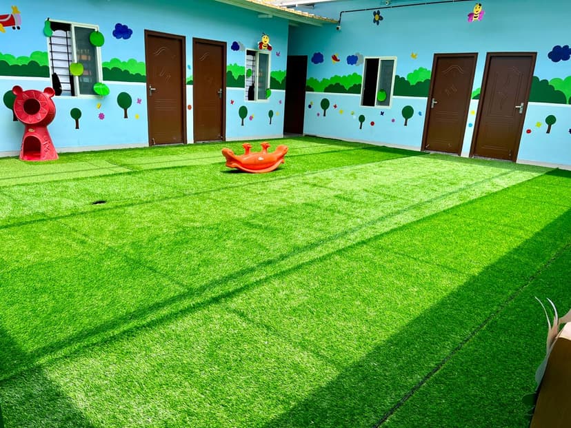 Outdoor play area at Kidzee Kasavanahalli with safe playground equipment for children